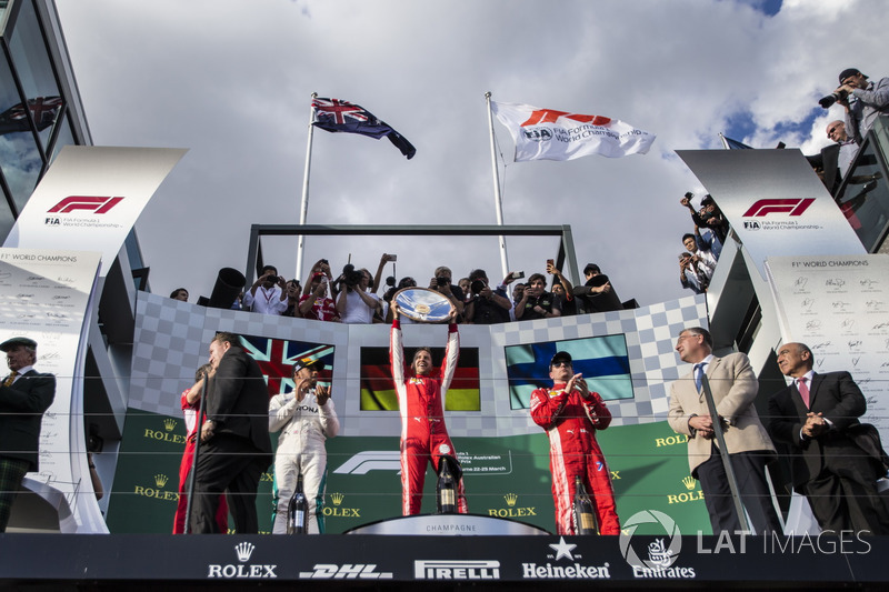 Lewis Hamilton, Mercedes-AMG F1, Sebastian Vettel, Ferrari and Kimi Raikkonen, Ferrari celebrate on 