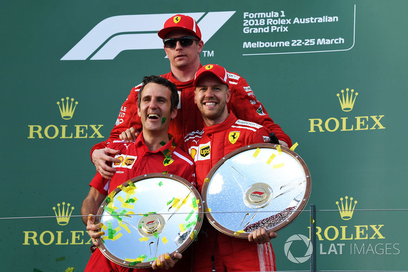 Race winner Sebastian Vettel, Ferrari celebrates on the podium with Kimi Raikkonen, Ferrari and the trophies