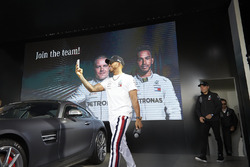 Lewis Hamilton, Mercedes AMG F1, and Valtteri Bottas, Mercedes AMG F1, on stage