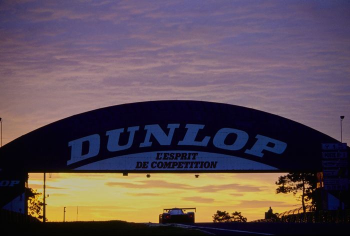 #1 Team Sauber Mercedes-Benz C11 Mercedes Turbo V8: Jochen Mass from Germany, Alain Ferte, Jean-Louis Schlesser passes under the Dunlop Bridge