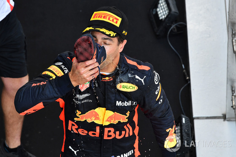 Race winner Daniel Ricciardo, Red Bull Racing celebrates on the podium with a shoey