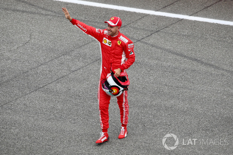 Pole sitter Sebastian Vettel, Ferrari celebrates in parc ferme