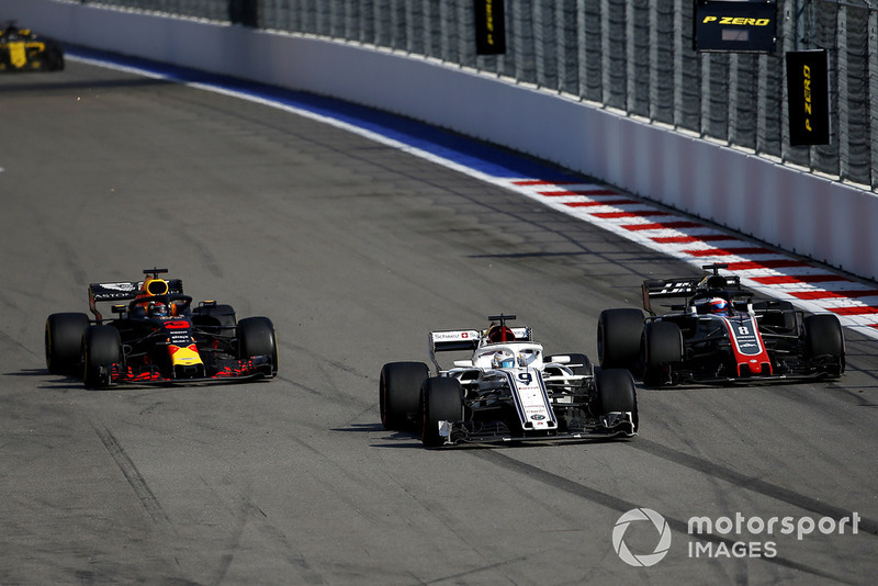 Marcus Ericsson, Sauber C37, Romain Grosjean, Haas F1 Team VF-18 and Daniel Ricciardo, Red Bull Racing RB14