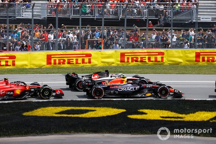 Sergio Pérez, Red Bull Racing RB19, Kevin Magnussen, Haas VF-23, Carlos Sainz, Ferrari SF-23