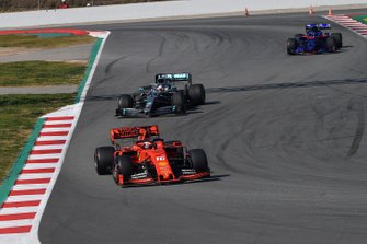 Charles Leclerc, Ferrari SF90 leads Lewis Hamilton, Mercedes-AMG F1 W10