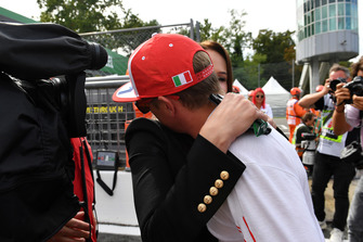 Pole sitter Kimi Raikkonen, Ferrari celebrates in parc ferme with his wife Minttu Virtanen