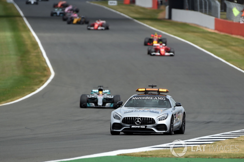 Safety car leads the field