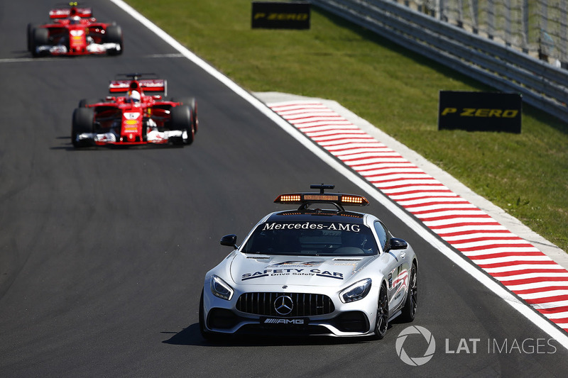 The Safety Car leads Sebastian Vettel, Ferrari SF70H, Kimi Raikkonen, Ferrari SF70H