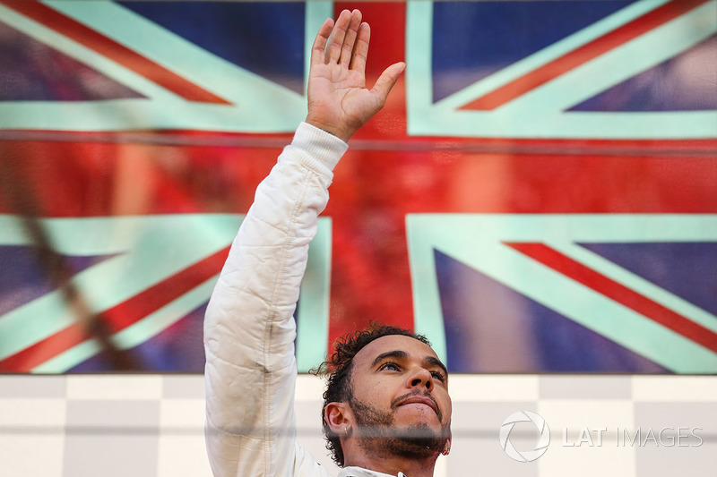 Lewis Hamilton, Mercedes AMG F1 celebrates on the podium and waves