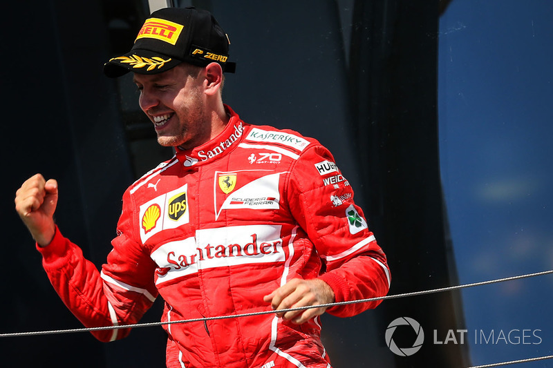 Podio: ganador de la carrera Sebastian Vettel, Ferrari