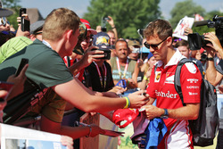 Sebastian Vettel, Ferrari signs autographs for the fans