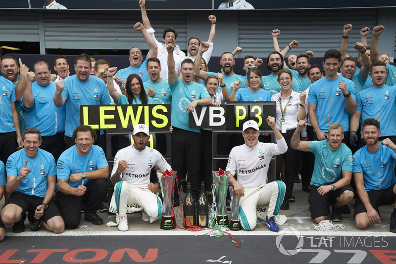 Lewis Hamilton, Mercedes AMG F1, Valtteri Bottas, Mercedes AMG F1, and colleagues, including Toto Wolff, Executive Director (Business), Mercedes AMG, celebrate victory