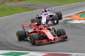Sebastian Vettel, Ferrari SF71H and Sergio Perez, Racing Point Force India VJM11 battle