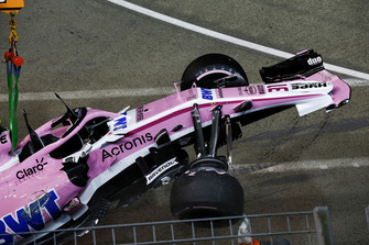 The crashed car of Esteban Ocon, Racing Point Force India VJM11 is recovered