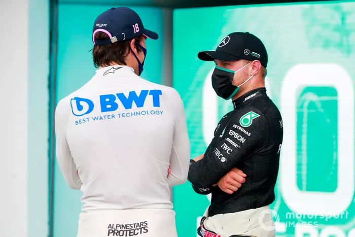 Tercero Lance Stroll, Racing Point y el segundo Valtteri Bottas, Mercedes-AMG Petronas F1 en Parc Ferme