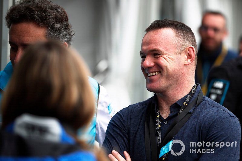 Footballer Wayne Rooney in the pit lane
