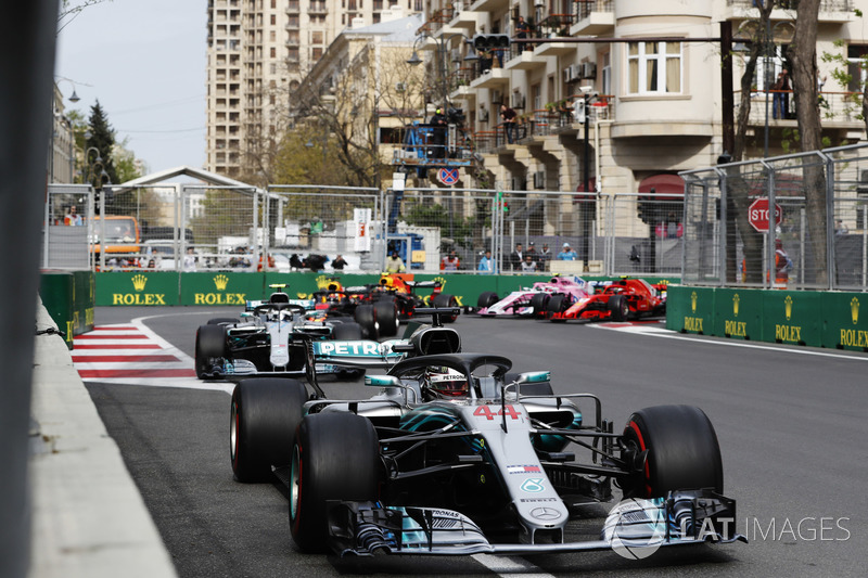 Lewis Hamilton, Mercedes AMG F1 W09, leads Valtteri Bottas, Mercedes AMG F1 W09, Daniel Ricciardo, Red Bull Racing RB14 Tag Heuer, Max Verstappen, Red Bull Racing RB14 Tag Heuer, Kimi Raikkonen, Ferrari SF71H, and Esteban Ocon, Force India VJM11 Mercedes, at the start