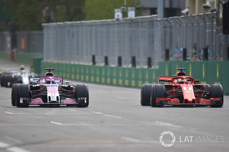 Sebastian Vettel, Ferrari SF71H and Sergio Perez, Force India VJM11