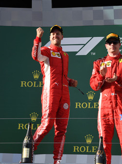Race winner Sebastian Vettel, Ferrari celebrates on the podium