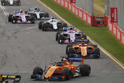 Fernando Alonso, McLaren MCL33 Renault, leads Stoffel Vandoorne, McLaren MCL33 Renault, Sergio Perez