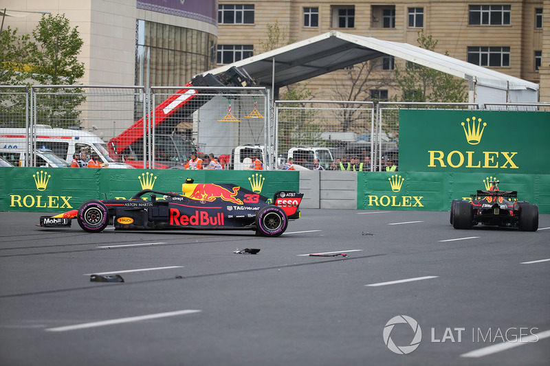 The crashed cars of Max Verstappen, Red Bull Racing RB14 and Daniel Ricciardo, Red Bull Racing RB14