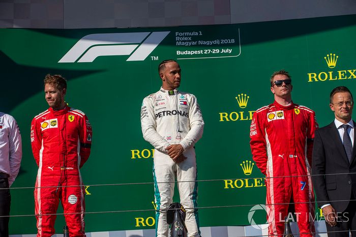 Sebastian Vettel, Ferrari, Lewis Hamilton, Mercedes-AMG F1 y Kimi Raikkonen, Ferrari en el podio