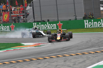 Max Verstappen, Red Bull Racing RB14 and Valtteri Bottas, Mercedes AMG F1 W09 battle