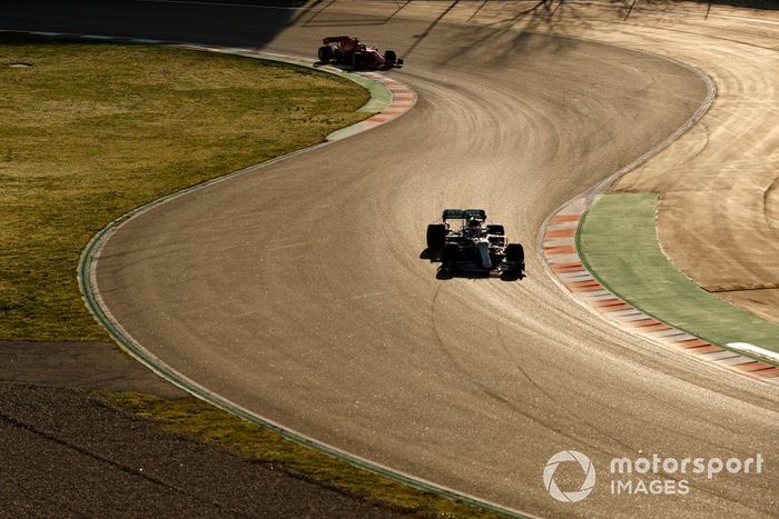 Lewis Hamilton, Mercedes F1 W11 leads Sebastian Vettel, Ferrari SF1000 