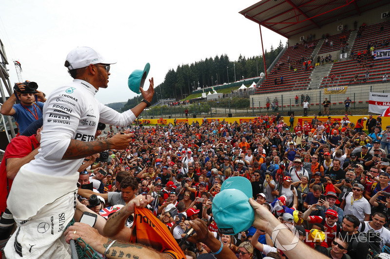 Race winner Lewis Hamilton, Mercedes AMG F1, celebrates with fans after the race