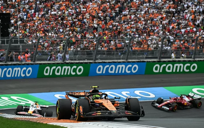 Lando Norris, McLaren, Isack Hadjar, Racing Bulls Team