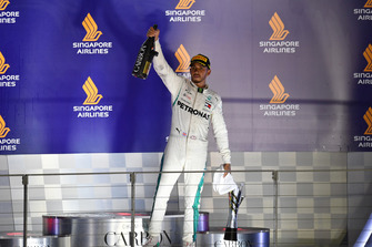 Lewis Hamilton, Mercedes AMG F1 celebrates with the champagne on the podium