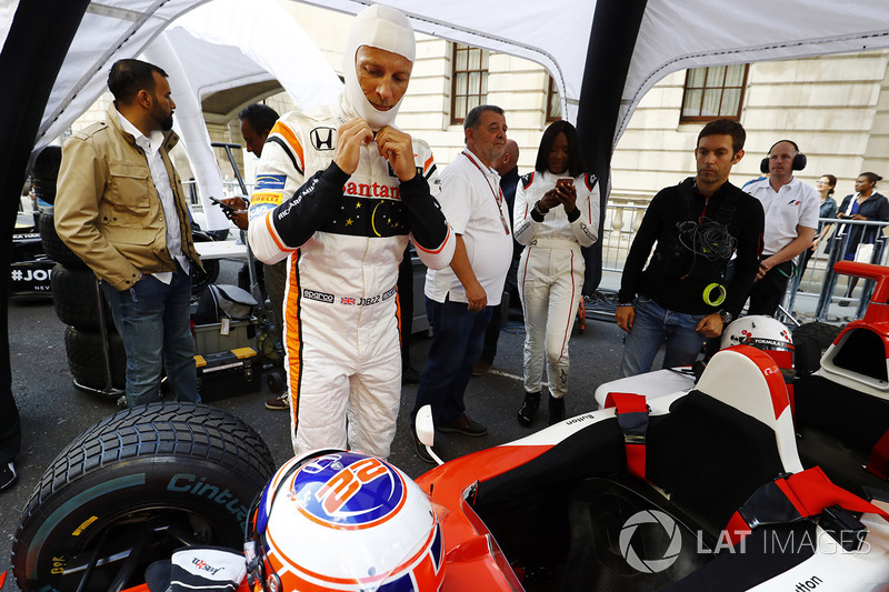 Jenson Button, McLaren, prepares to drive a 2 seat demo car