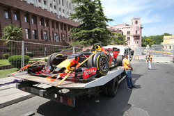 The Red Bull Racing RB12 of Daniel Ricciardo, Red Bull Racing is recovered back to the pits on the back of a truck