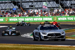 The Safety Car leads Valtteri Bottas, Mercedes AMG F1 W09