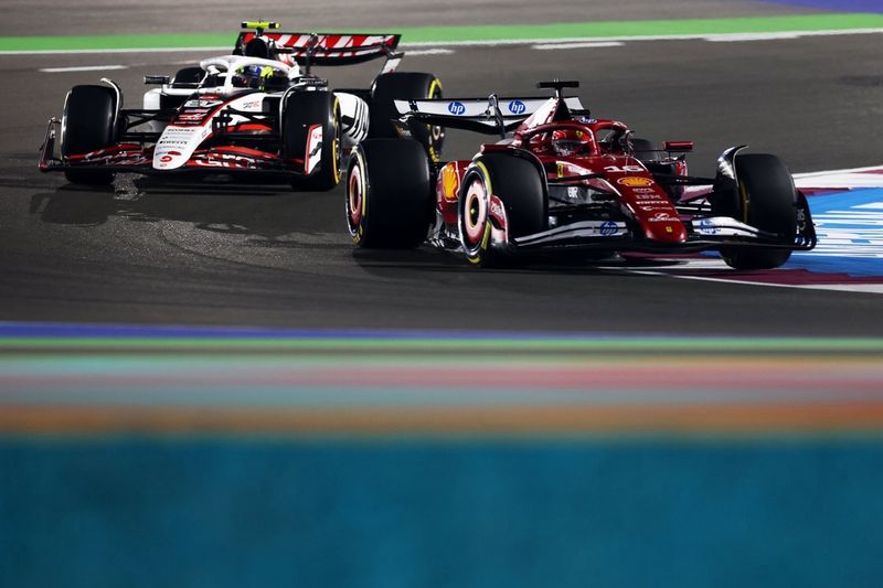 Charles Leclerc, Ferrari, Oliver Bearman, Haas F1 Team