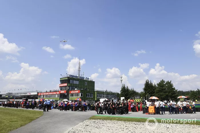 Grid with Repsol Hondas at the back