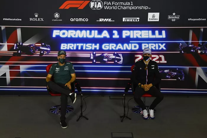 Sebastian Vettel, Aston Martin, and Esteban Ocon, Alpine F1, in the press conference