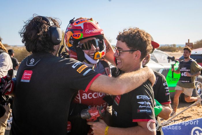 Laia Sanz, Sainz XE Team, 1st position, is congratulated by her team mates