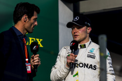 Valtteri Bottas, Mercedes AMG, 3rd Position, is interviewed by Mark Webber on the podium