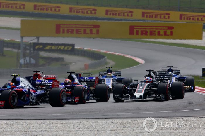 Carlos Sainz Jr., Scuderia Toro Rosso STR12, Pierre Gasly, Scuderia Toro Rosso STR12, Romain Grosjean, Haas F1 Team VF-17