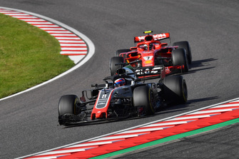 Romain Grosjean, Haas F1 Team VF-18 voor Kimi Raikkonen, Ferrari SF71H