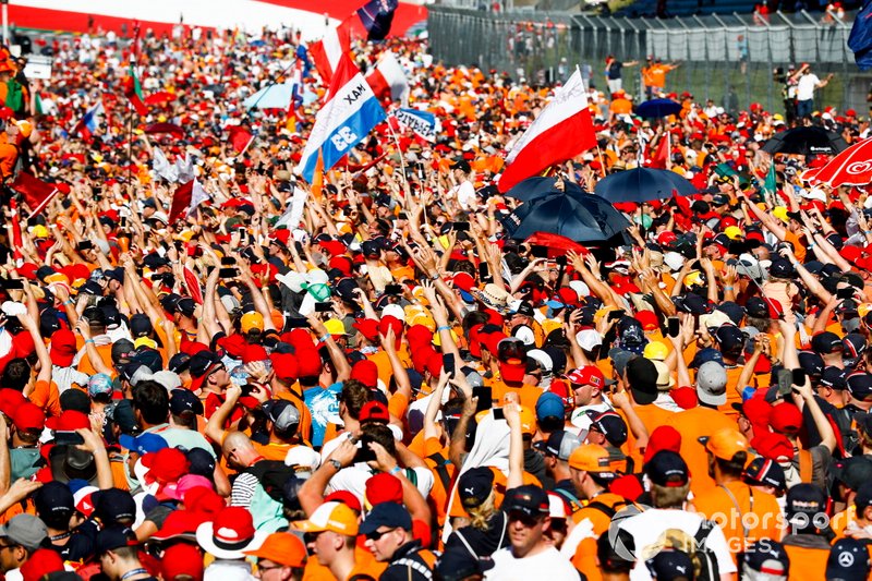 Dutch fans storm the Red Bull Ring to celebrate the victory of Max Verstappen