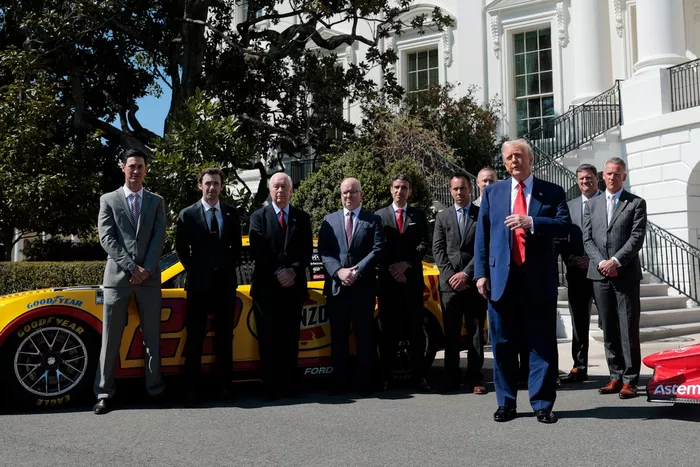 U.S. President Donald Trump, Roger Penske, Joey Logano, Ryan Blaney