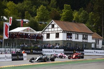Lewis Hamilton, Mercedes AMG F1 W09, leads Sebastian Vettel, Ferrari SF71H, and Esteban Ocon, Racing Point Force India VJM11, on the formation lap