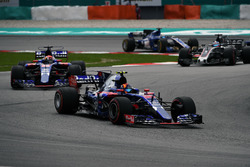 Carlos Sainz Jr., Scuderia Toro Rosso STR12 leads Pierre Gasly, Scuderia Toro Rosso STR12