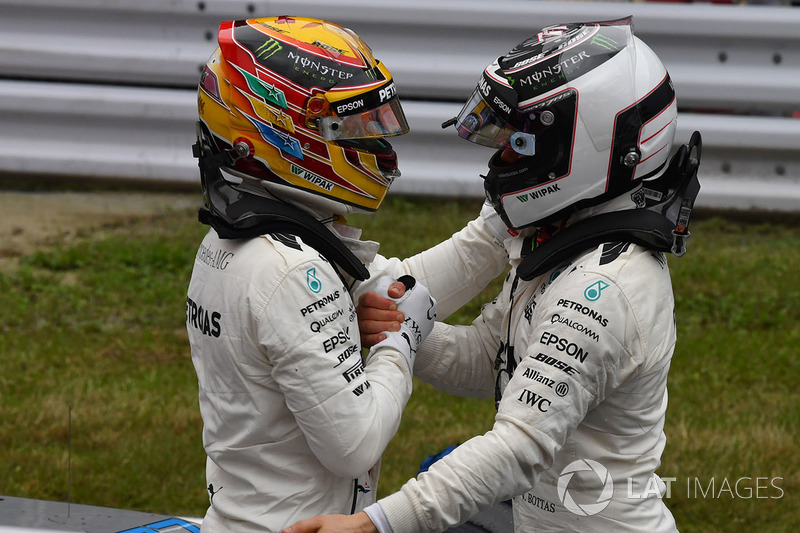 Pole sitter Lewis Hamilton, Mercedes AMG F1 and Valtteri Bottas, Mercedes AMG F1 celebrate in parc ferme