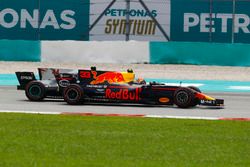 Max Verstappen, Red Bull Racing RB13, passes Lewis Hamilton, Mercedes F1 W08