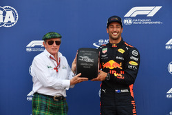 Pole sitter Daniel Ricciardo, Red Bull Racing receives the Pirelli Pole Position Award from Jackie Stewart