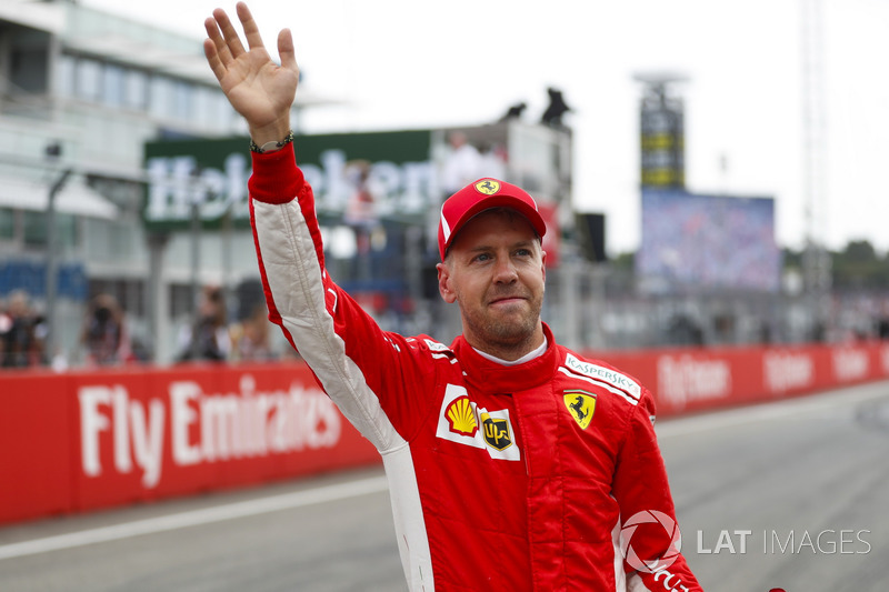 Sebastian Vettel, Ferrari, celebrates his pole position