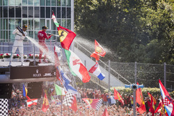 Race winner Third place Lewis Hamilton, Mercedes AMG F1 Sebastian Vettel, Ferrari, celebrate on the